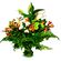 Зимний сад. Пышный букет, подчеркивающий нежность лилии, оттененной белыми и зелеными хризантемами.